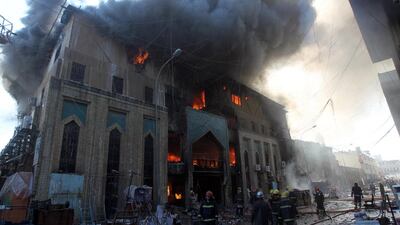 Baghdad’s Shorjah market, which dates back 700 years, went up in flames after two bomb blasts hit the structure on February 13, killing at least two and wounding at least 11. Ahmad al-Rubaye / AFP
