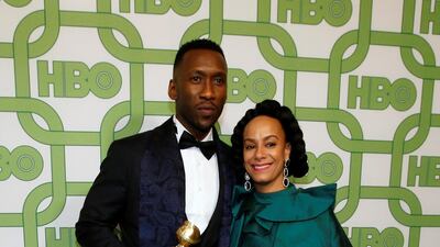 Mahershala Ali, winner of Best Supporting Actor, Motion Picture, and his wife Amatus Sami-Karim. REUTERS