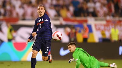 Antoine Griezmann of France runs around Dominik Livakovic of Croatia during the Uefa Nations League League A Group 1 match at Stadion Poljud on June 06, 2022 in Split, Croatia. The match ended 1-1. Getty Images