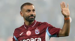 Trabzonspor's Egyptian forward Mohamed Salah gestures during his signing cerenomy at the Papara Park Stadium in Trabzon on August 6, 2026. Former Liverpool star Mohamed Salah on August 6, 2026 signed a two-year contract with Turkish club Trabzonspor after leaving the Premier League giants at the end of his contract. (Photo by Nurgul GUNAYDIN / AFP)