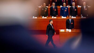 Chinese President Xi Jinping prepares to take his oath during the National People's Congress at the Great Hall of the People in Beijing. EPA