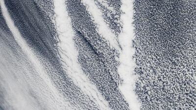 What begins with N? Numerous cloud condensation nuclei in the North Pacific! Nefarious nitrogen dioxide and NOx. The near infrared and NDVI and the Nimbus satellite. Nor’easters and the Nile at night. On March 4, 2009, the Moderate Resolution Imaging Spectroradiometer on the Terra satellite captured this image of ship tracks over the Pacific. Ship emissions contain small particles that cause the clouds to form. Courtesy NASA