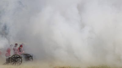Nepalese army soldiers fire a cannon during an event to celebrate Fulpati, the seventh day of Navratri, in Tundhikhel, Kathmandu. Reuters