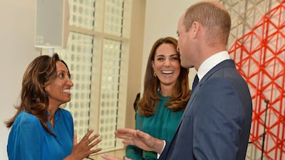 Britain's Prince William, Duke of Cambridge and Britain's Catherine, Duchess of Cambridge chat with English stand-up comedian Shazia Murza during their visit to the Aga Khan Centre in London. AFP