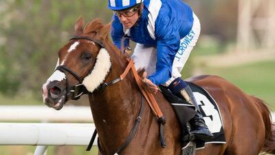 Jim Crowley rides Al Zahir to victory in the Group 1 Emirates Championship at Abu Dhabi on Saturday. Erika Rasmussen for The National
