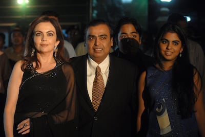 Nita Ambani with her family, from left, Mukesh, Anant and Isha. Photo: Prodip Guha / Getty Images