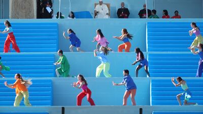 LISBON, PORTUGAL - AUGUST 3: Pope Francis watches the performance of a dance group on the stage on the Meeting Hill at Parque Eduardo VII on August 3, 2023 in Lisbon, Portugal. Pope Francis visits Portugal for World Youth Day (WYD) which takes place over the first week of August. WYD is an international Catholic rally inaugurated by St. John Paul II to invigorate young people in their faith. Pope Francis will travel around Portugal during his five-day visit holding masses and confessions for young people and meeting Portuguese catholic clergy members, he will also visit The Shrine of Our Lady of Fatima. (Photo by Andre Kosters - Pool / Getty Images)
