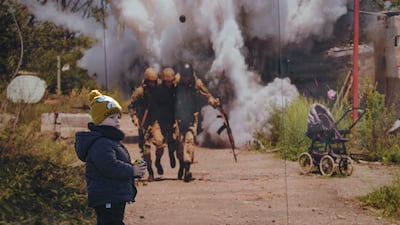 A child stands near a memorial for those killed in the confrontation between Ukraine's military and pro-Russia separatist forces in Sievierodonetsk, Luhansk region of eastern Ukraine. AP