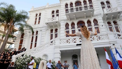 A choir sings during the reopening of the Sursock museum. AFP