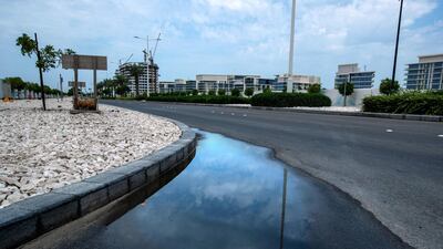 The rain pooled on the roads of Saadiyat Island. Victor Besa / The National.