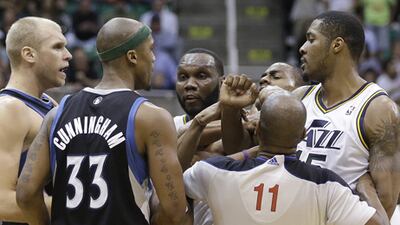 Official Derrick Collins separates players from Minnesota and Utah.