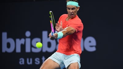 Rafael Nadal returns against Dominic Thiem. EPA