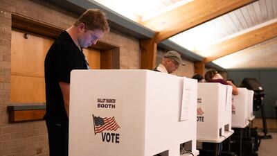 Voters fill out their ballots on Election Day in Columbus, Ohio. AFP
