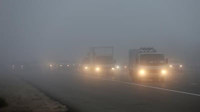Traffic during the morning fog on Dubai - Abu Dhabi highway near Ghantoot area in Abu Dhabi. Pawan Singh / The National