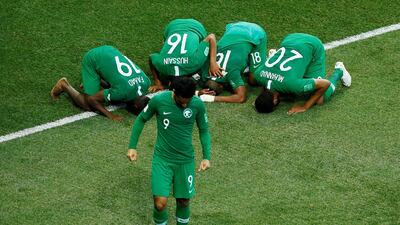 Saudi Arabia players celebrate after the match between Egypt. Jason Cairnduff / Reuters