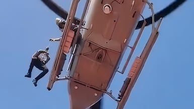A sailor is winched up to safety after unladen oil tanker MT Marivex was hit by US missiles off Oman. Photo: All India Seafarers and General Workers Union