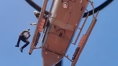 A sailor is winched up to safety after unladen oil tanker MT Marivex was hit by US missiles off Oman. Photo: All India Seafarers and General Workers Union