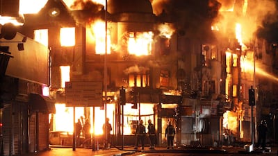 A property is on fire near Reeves Corner in Croydon, south London, Tuesday, Aug. 9, 2011. A wave of violence and looting raged across London and spread to three other major British cities on Tuesday, as authorities struggled to contain the country's worst???
