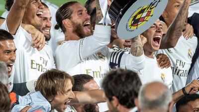 Real Madrid's captain Sergio Ramos lifts the La Liga trophy after their win over Villarreal CF at the Alfredo Di Stefano Stadium on Thursday. EPA