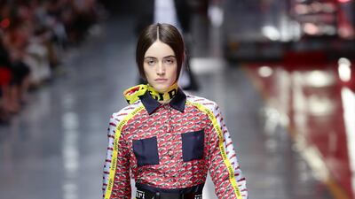 A model walks the runway at the fashion debut of the first co-ed Ferrari collection at Ferrari Factory on June 13, 2021 in Maranello, Italy. Getty Images