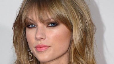 Taylor Swift arrives for the 2013 American Music Awards. Frederic J. Brown / AFP Photo