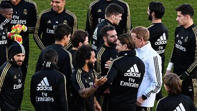 Real Madrid players at the public training session. AFP