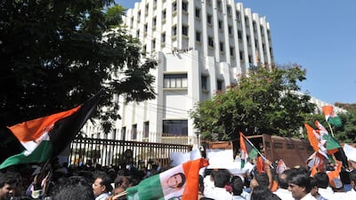 Above, protesters in front of the Reserve Bank of India in Hyderabad. Noah Seelam / AFP