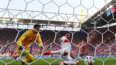 Turkey's Samet Akaydin scores an own goal. Reuters