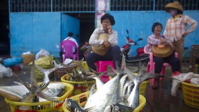 Women sell the catch at wholesale market in Dongfang, west of Hainan. China's per-capita fish consumption was 35.1kg in 2010, nearly double the global average of 18.9kg. John Ruwitch / Reuters