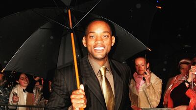 Will Smith, in brown pinstripes, attends the premiere of 'I, Robot' at Fox Studios on July 19, 2004 in Sydney, Australia. Getty Images