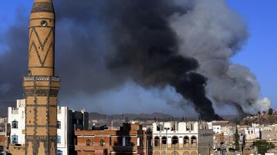 Smokes billowing from a weapons depots of a Houthi-held military base following airstrikes carried out by the Saudi-led coalition in Sanaa, Yemen. Yahya Arhab / EPA