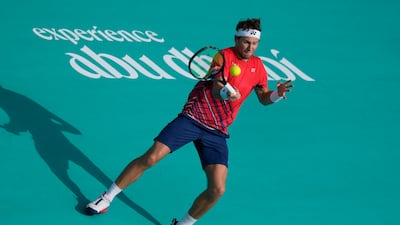 Casper Ruud hits a forehand to Carlos Alcaraz. AP