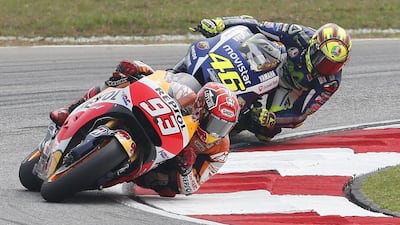 Marc Marquez, front, and Valentino Rossi, back, infamously collided during the Malaysian Grand Prix last month. Olivia Harris / Reuters