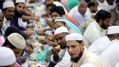 People gather together to break their fast.