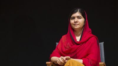 Malala Yousafzai sits on stage in Abu Dhabi on Wednesday during a preview of ‘He Named Me Malala’, a documentary film about her and her family’s experiences in Pakistan’s Swat Valley. Reem Mohammed / The National