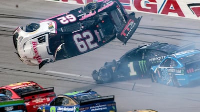 Brendan Gaughan flips his car during a NASCAR Cup Series auto race at Talladega Superspeedway, on Monday, October 14. AP