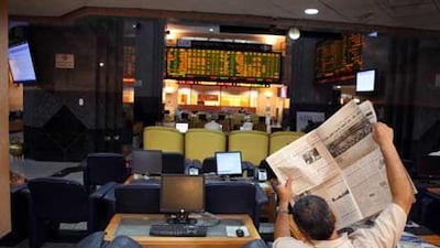 A quiet moment at the Abu Dhabi Securities Exchange. Some major stocks in the UAE are near their cap for foreign ownership.