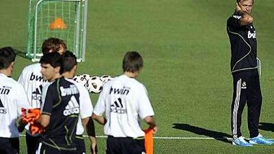 Jose Mourinho, Real Madrid's new coach, right, has added Pedro Leon, the midfielder, to his impressive team for next season.