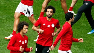 Egypt's Mohamed Salah, right, and his teammates attend a training session in Saint Petersburg. Etienne Laurent / EPA