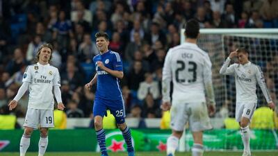 Klaas-Jan Huntelaar celebrates scoring the fourth and winning goal for Schalke on Tuesday night in the Champions League last 16 second leg match against Real Madrid. Gonzalo Arroyo Moreno / Getty Images