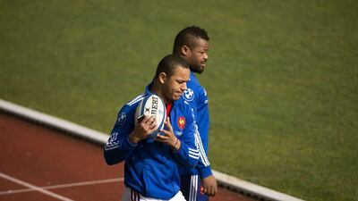 Gael Fickou, left, with Mathieu Bastareaud, right, at a France training session on Thursday. Lionel Bonaventure / AFP / March 13, 2014