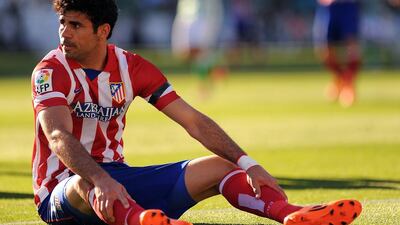 Atletico's second goal came from Brazilian forward Diego Costa as they defeated Real Betis at Benito Villamarin Stadium in Seville on March 23, 2014. Jorge Guerrero / AFP