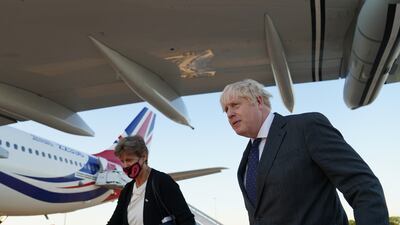 Boris Johnson with Dame Barbara Janet Woodward, UK's envoy at the United Nations as he lands in New York. PA
