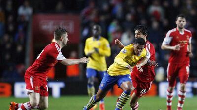 Arsenal could lose their spot atop the Premier League table if either Chelsea or Manchester City win on Wednesday. Adrian Dennis / AFP