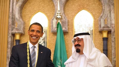 US President Barack Obama shakes hands with King Abdullah after Obama was presented with the King Abdul Aziz Order of Merit. Mandel Ngan / AFP Photo