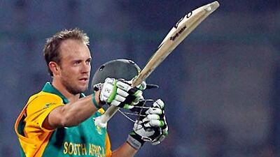 South Africa's AB de Villiers celebrates after scoring his century against the West Indies.