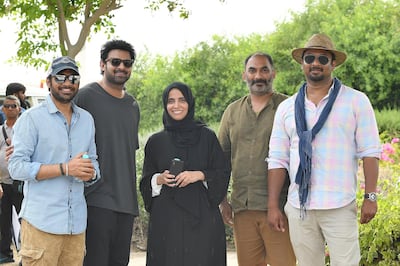 Twofourfiftyfour's H.E. Maryam Eid AlMheiri with the film's producers Pramod Uppalapati and Vamsi Krishna Reddy, as well as Prabhas and the film's director Sujeeth Reddy. Supplied