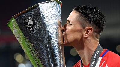 Fernando Torres of Atletico Madrid celebrates with the trophy after winning the UEFA Europa League Final between Olympique de Marseille and Club Atletico de Madrid at Stade de Lyon in Lyon, France, on May 16, 2018. Matthias Hangst / Getty Images