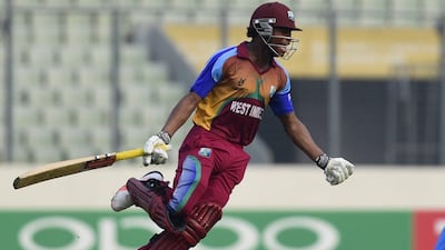 West Indies cricketer Keacy Carty reacts after winning the Under-19 World Cup cricket final between India and West Indies at the The Sher-e-Bangla National Cricket Stadium in Dhaka on February 14, 2016. AFP PHOTO / Munir uz ZAMAN