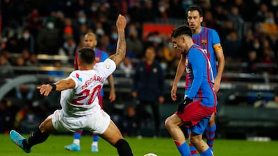 Pedri controls the ball before scoring the opening goal for Barcelona against Sevilla. AP